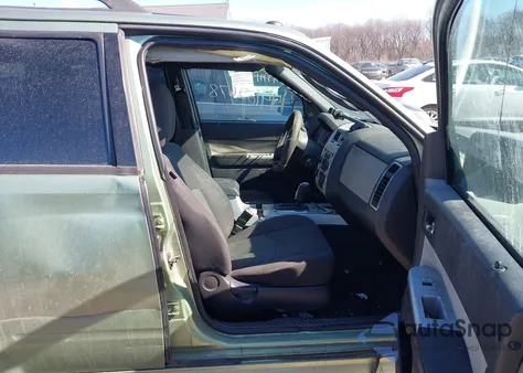 2009 Mercury Mariner I4 z USA, uszkodzony, nr VIN 4M2CU81799KJ17356